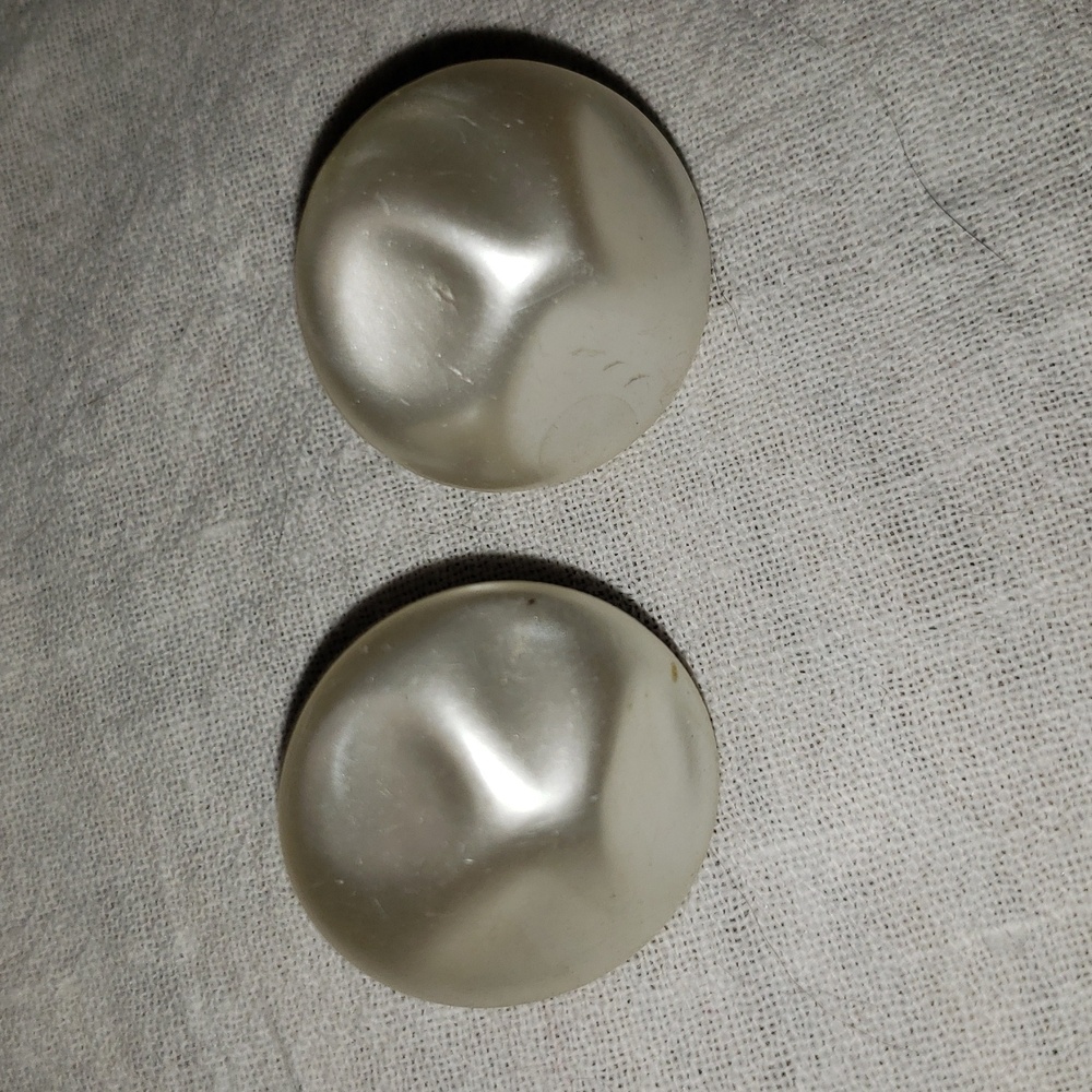 Vintage clip-on earrings, made of lucite with a faux pearl finish From Japan